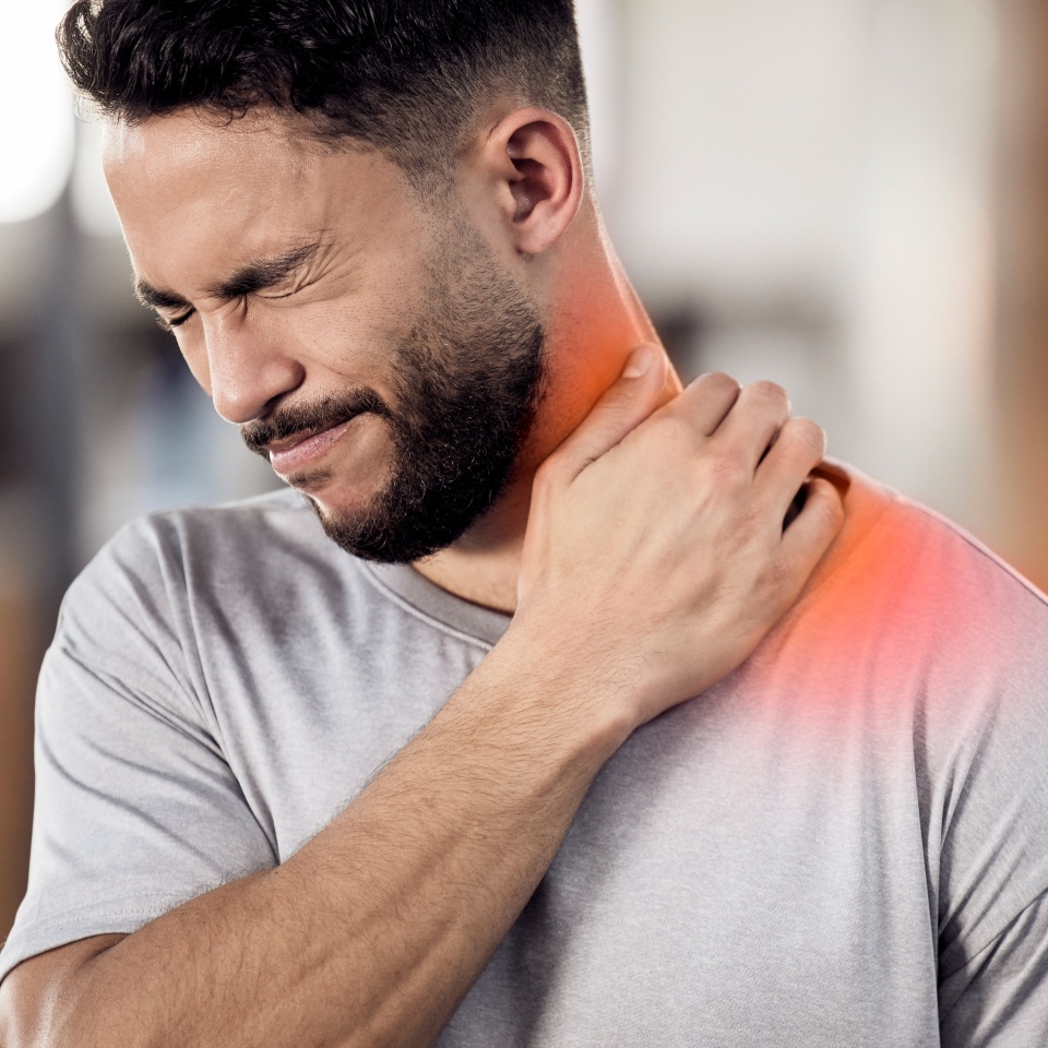 Man, athlete and neck pain in gym, inflammation and muscle sprain or tender from exercise. Male person, runner and red injury from marathon or training practice, hurt and ache or sport accident