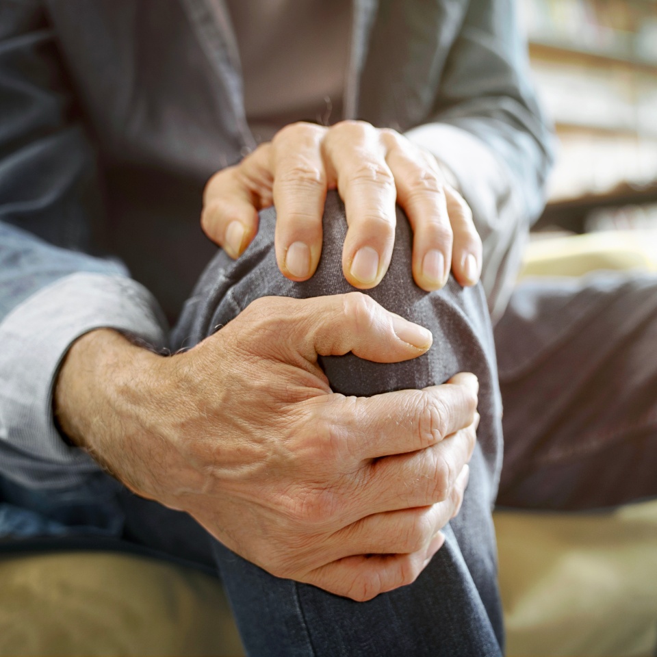 Old man suffering from knee