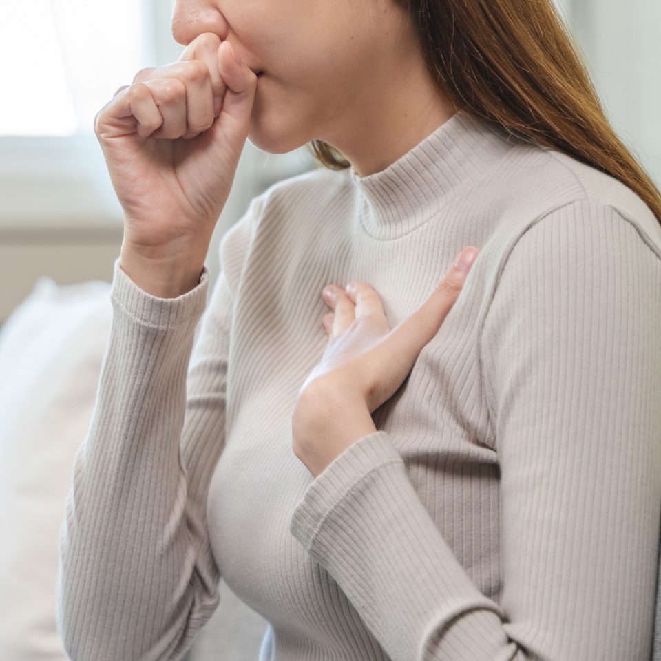 Female unhealthy Sickness, asian young woman, girl unwell and coughing, have cold, sore throat isolated white background suffering with symptom cough feeling bad. Healthcare of Coronavirus, covid-19.