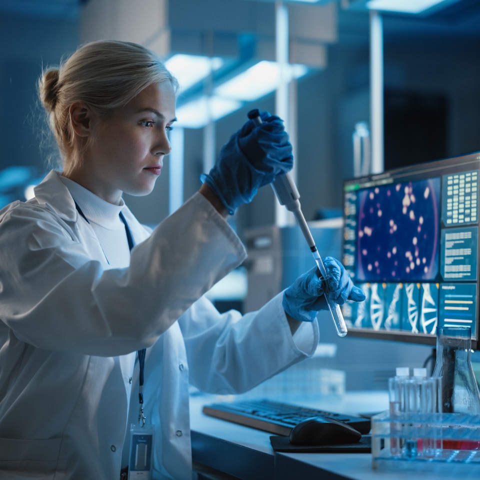 Medical Research Laboratory: Portrait of Female Scientist Working with Samples, using Micro Pipette Analysing Sample. Advanced Scientific Lab for Medicine, Biotechnology, Vaccine Development