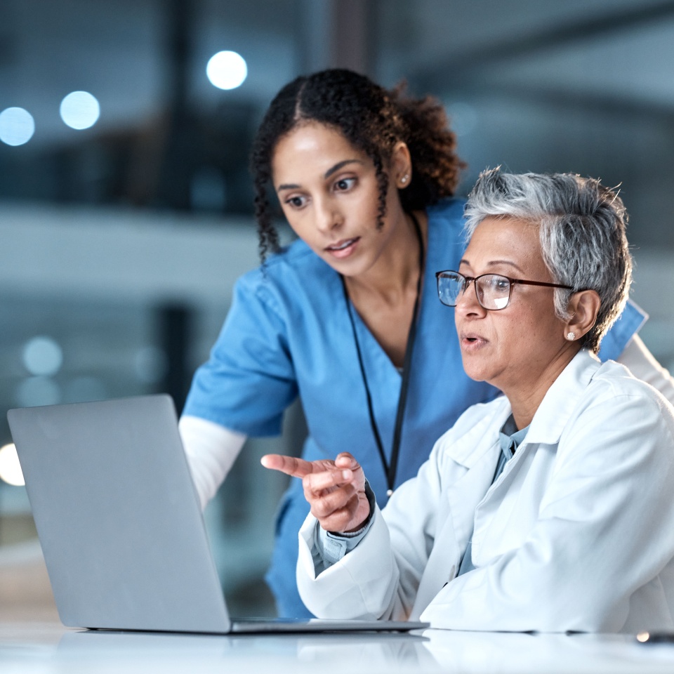 Doctors, nurse or laptop in night healthcare, planning research or surgery teamwork in wellness hospital. Talking, thinking or medical women on technology for collaboration help or life insurance app