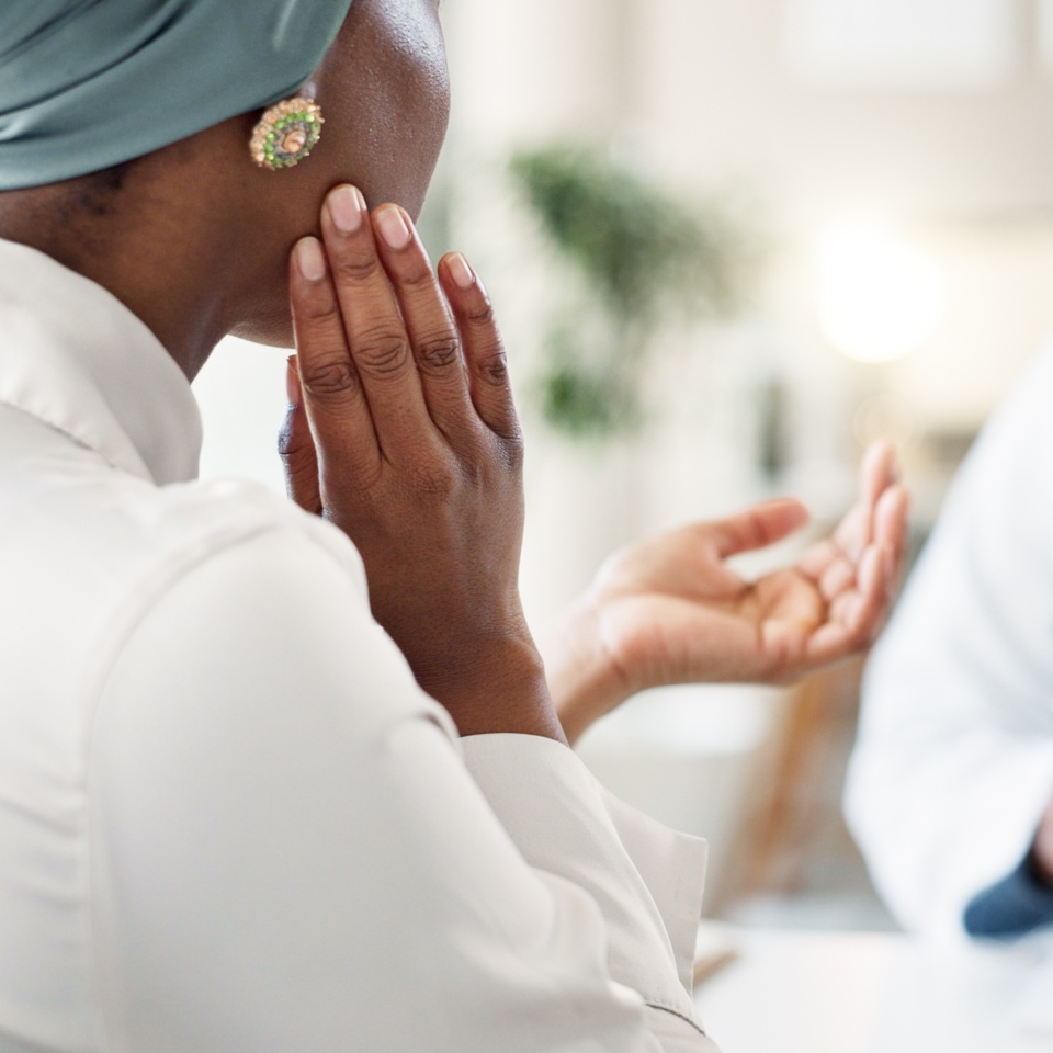 Healthcare, consulting and doctor with patient in clinic for orthopedic expert, jaw pain and tmj treatment. Medical, advice and meeting with people in hospital for insurance, feedback or test results